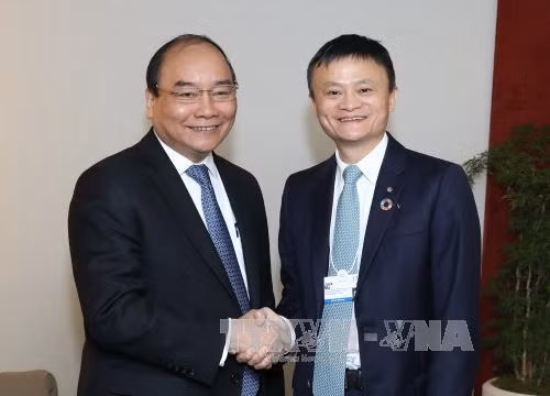 越南政府总理阮春福会见若干国际金融组织和企业领导 ảnh 3