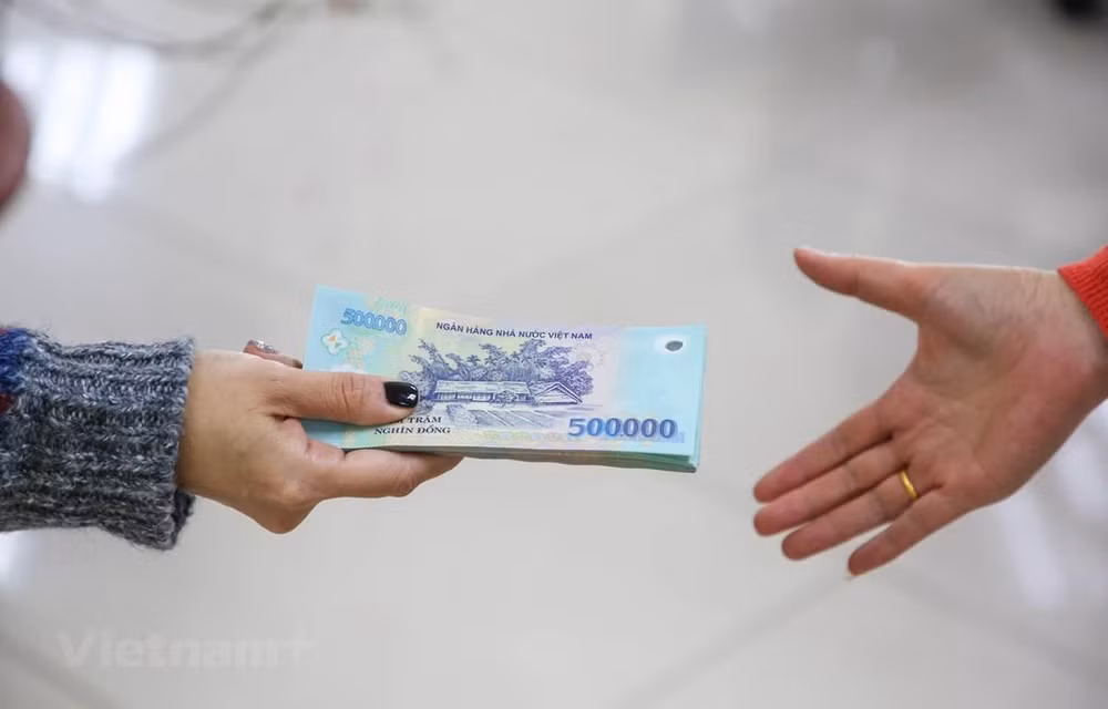 从7月1日起基本工资上涨20%:劳动者喜忧参半 ảnh 1 从7月1日起基本工资上涨20%:劳动者喜忧参半 ảnh 1