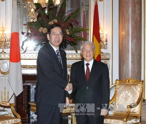 越共中央总书记阮富仲会见日本共产党中央委员会委员长志位和夫 ảnh 1