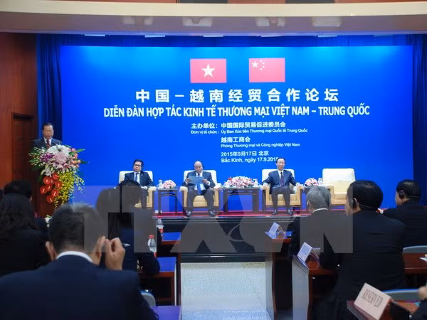 越南政府副总理阮春福出席越中经贸合作论坛 ảnh 1 越南政府副总理阮春福出席越中经贸合作论坛 ảnh 1