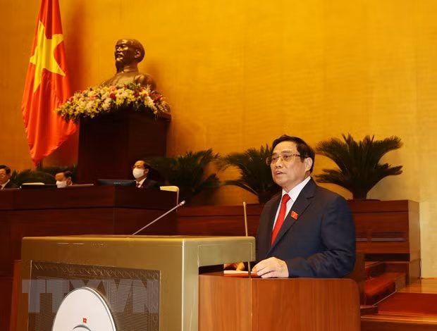 越南第十五届国会第一次会议：政府总理向国会提交新一届政府的组织方案 ảnh 1
