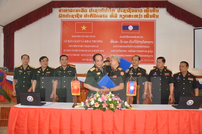越南协助老挝建设国防部门户网站 ảnh 1