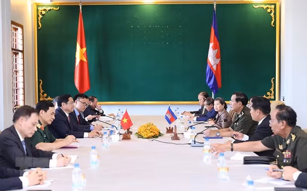 越南政府总理范明政会见柬埔寨首相洪森 ảnh 1