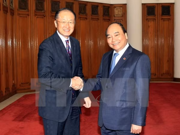 越南政府副总理阮春福会见世界银行行长金庸 ảnh 1 越南政府副总理阮春福会见世界银行行长金庸 ảnh 1