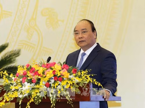 政府总理阮春福：提高单位领导人和个人在落实2018年经济社会任务的责任意识 ảnh 2