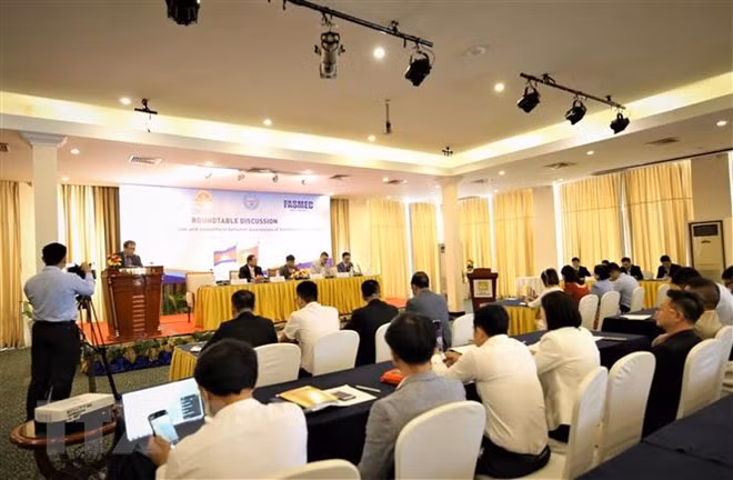 越柬投资贸易促进研讨会在首都金边举行 ảnh 1