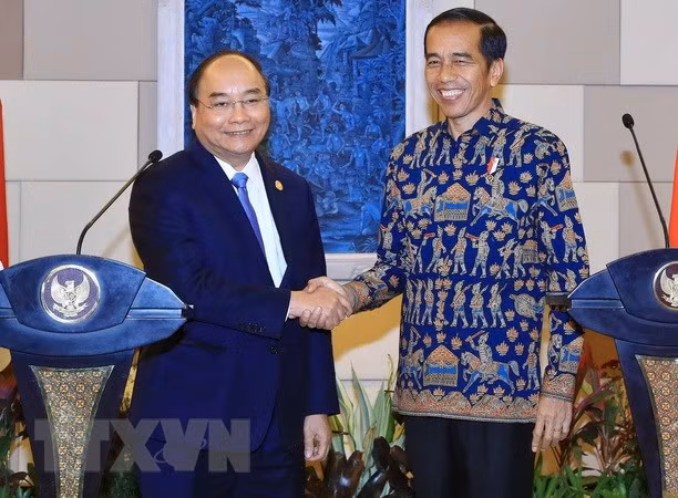 印尼学者：越南国家主席阮春福对印尼的访问成为两国关系新的里程碑 ảnh 1
