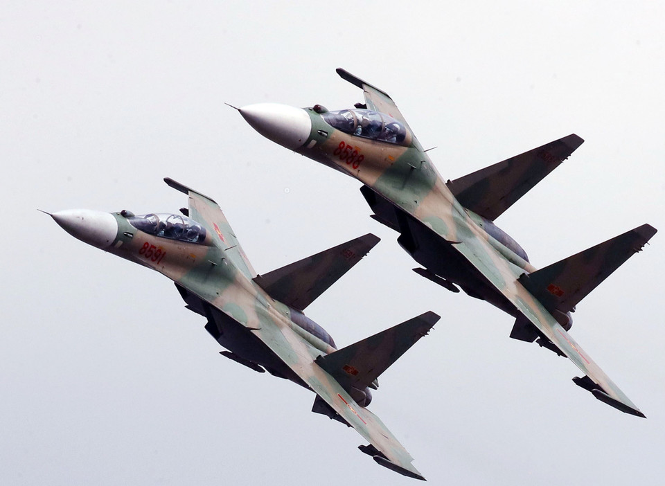 越南空军力量的迎宾飞行表演。图片来源：越通社发