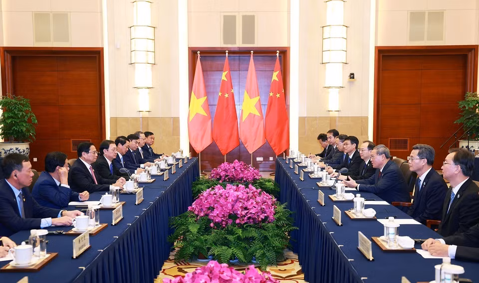 越南政府总理范明政同中国国务院总理李强举行会谈。图自越通社