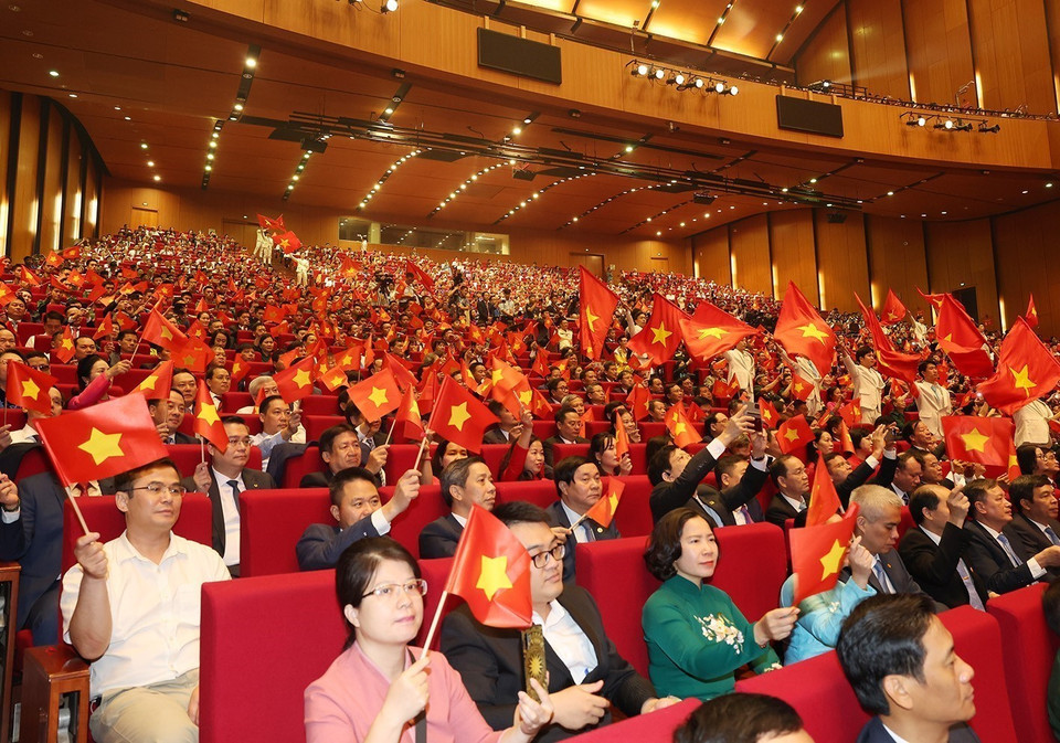 出席纪念典礼的各位代表。图自越通社