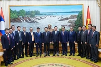 双方代表合影留念。图自越通社