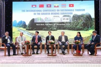 与会代表。图自越通社