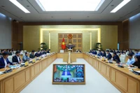 会议现场。图自越通社