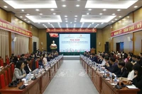 对话会现场。图自越通社