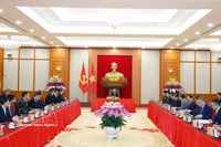 会见现场。图自越通社