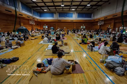 在熊本县宇城市疏散点暂住的受地震影响民众。图自越通社