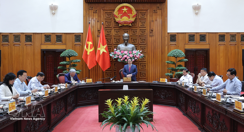越南政府总理范明政在会议上发表讲话。图自越通社