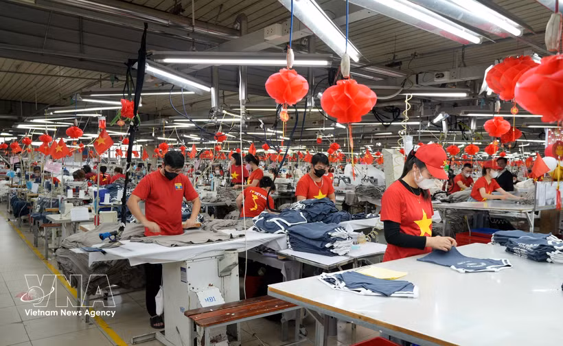 北宁省出口服装生产线。图自越通社