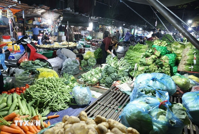 从正月初四起，市场开始恢复正常，初五当天更为明显。图自越通社