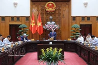 越南政府总理范明政在会议上发表讲话。图自越通社
