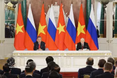 苏林与普京会见记者 图自越通社