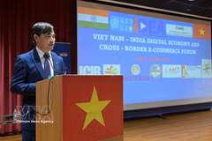 越南驻印度商务参赞裴忠尚在论坛开幕式上致辞。图自越通社。