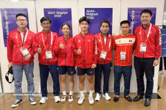 越南体育代表团运动员在第20届亚洲运动会（ASIAD 20）开幕式上入场。开幕式于2026年9月19日在日本名古屋市举行。（图：新华社/越通社发）