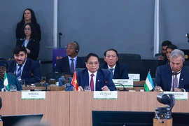 范明政总理出席“加强多边主义、经济金融问题及人工智能”高级别讨论会并发表讲话。图自越通社