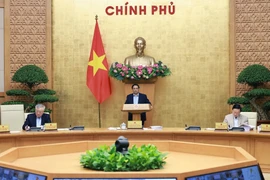 越南政府总理范明政主持召开10月例行政府会议