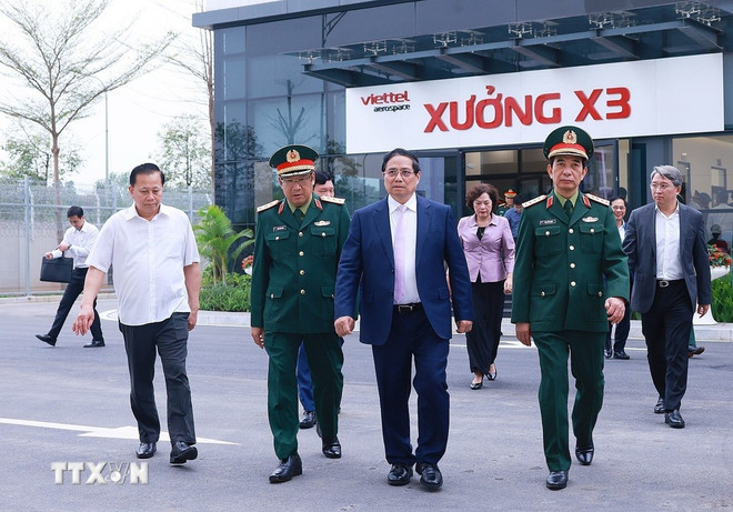范明政总理会见越南军队工业与电信集团领导 图自越通社 thu-tuong-4.jpg