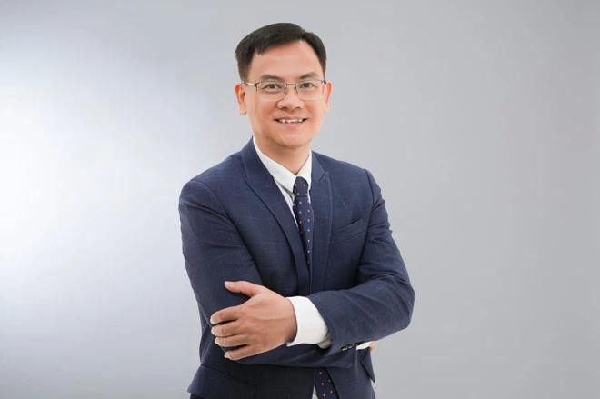 大华银行越南区货币业务执行经理丁德光。 (图自:照片:Vietnam+) T512.webp