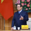 越南政府总理范明政在会上发表讲话。图自越通社