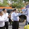 陈青敏在芹苴市宁桥坊检查国会代表及各级人民议会代表选举前期准备工作。图自越通社