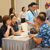 多家旅行社在2026年9月于广宁省举行的越南旅行社会议框架内对接广宁旅游产品。图自《广宁报》