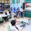 培育提升学生数字素养。图自越通社