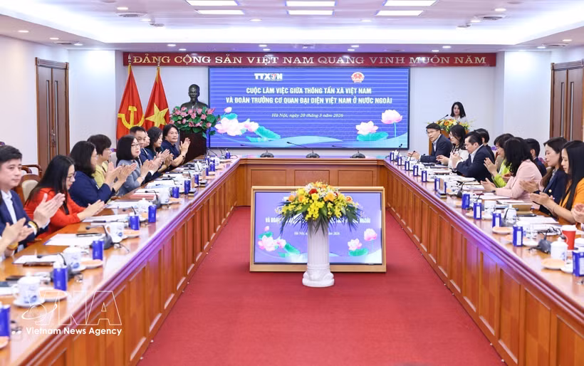 工作会谈场景。图自越通社