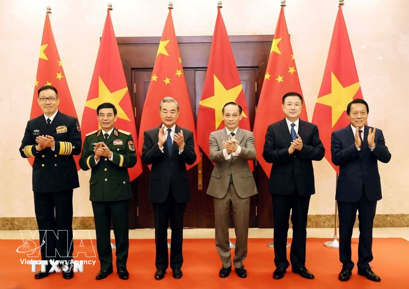 越中外交、国防、公安“3+3”战略对话机制首次部长级会议上的两国外交部长、国防部长和公安部长。图自越通社