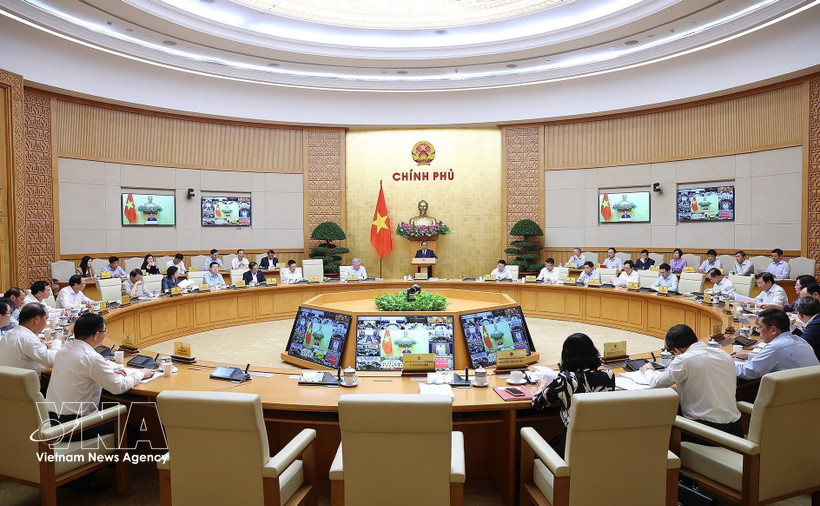 越南政府3月份例行会议和政府与各地方视频会议。图自越通社