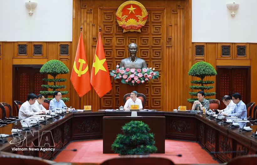 黎明兴总理主持会议。图自越通社