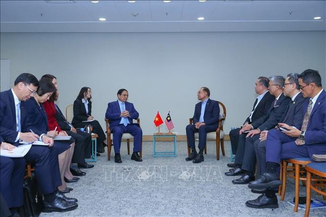 政府总理范明政会见马来西亚总理场景。图自越通社 malaysia-2.jpg