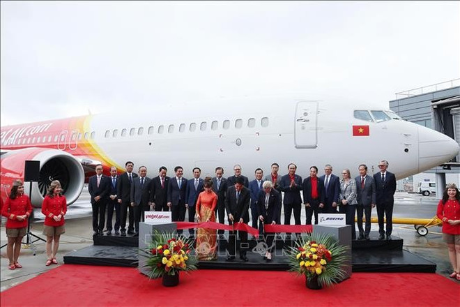 ChatGPT said: 国家主席梁强见证波音集团与越捷航空的首架波音737-8飞机交付。图自越通社 may-bay-2.jpg