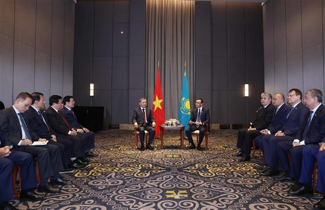 苏林总书记会见阿什姆巴耶夫场景。图自越通社 to-lam-2.jpg