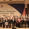 与会代表合影。图自越通社