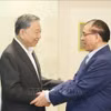 苏林总书记春节到来前走访慰问原越共中央总书记农德孟。图自越通社