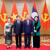 越共中央总书记苏林夫妇与老挝人民革命党中央总书记、老挝国家主席通伦·西苏里夫妇合影。图自越通社