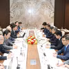 会见现场。图自越通社
