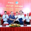 签署仪式现场。图自越通社