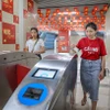 在河内城铁应用程序上试点使用周票。图自民族与信息报