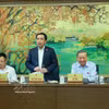 越共中央总书记、国家主席苏林同河内市国会代表进行分组讨论。图自越通社