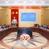 工作会谈现场。图自越通社